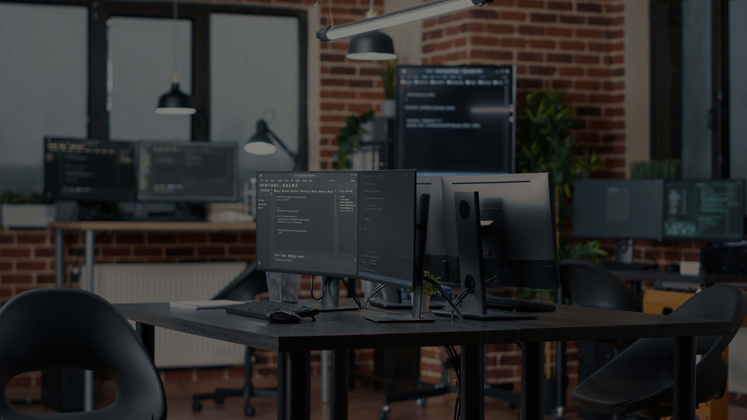 computer-screens-running-programming-code-empty-software-developing-agency-office-computers-parsing-data-algorithms-background-neural-network-servers-cloud-computing-data-room